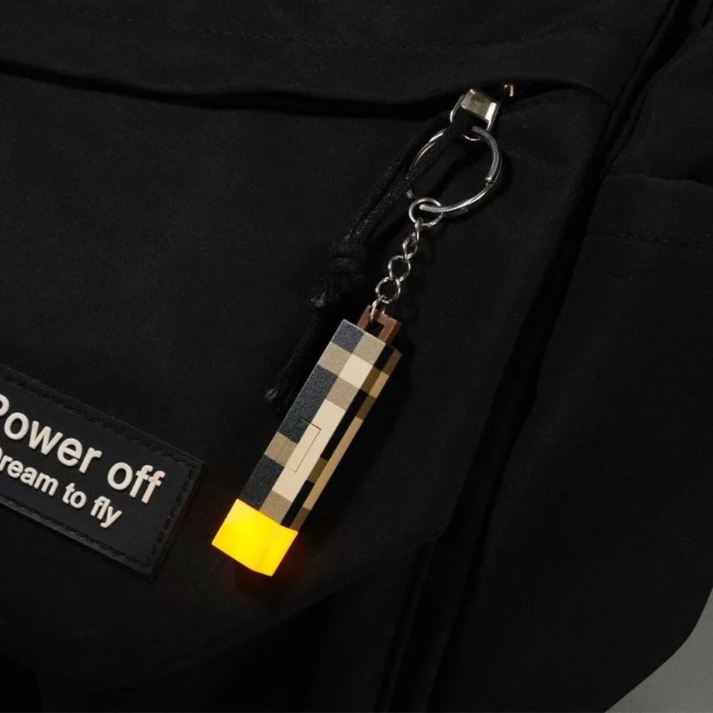 Pixel Torch Light Keychain – Battery Powered LED Mini Gadget for Fans!